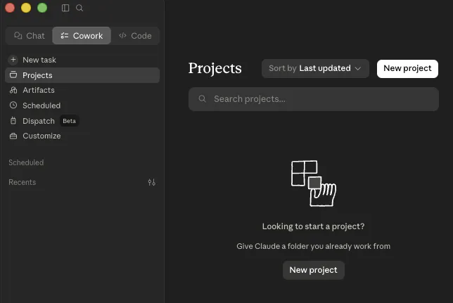 The Cowork tab in Claude Desktop on the Projects screen with an empty list: a left rail with New task, Projects, Artifacts, Scheduled, Dispatch and Customize, and a central empty state reading 'Looking to start a project? Give Claude a folder you already work from' above a 'New project' button.